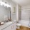 a1 bathroom with tiled bath and shower | Madison Shores
